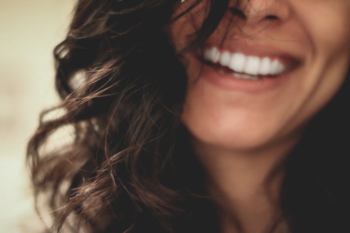 A patient smiling after treatment at Advocate Healthcare
